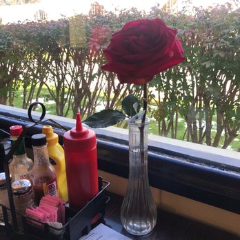 Tres Cafe - Real roses on the tables. - Breakfast & Brunch Near Me - Galesburg, Illinois