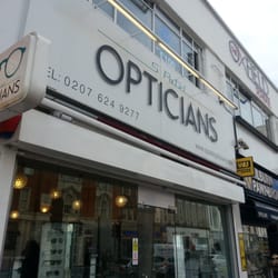 S Patel Opticians - Checking out new specs.