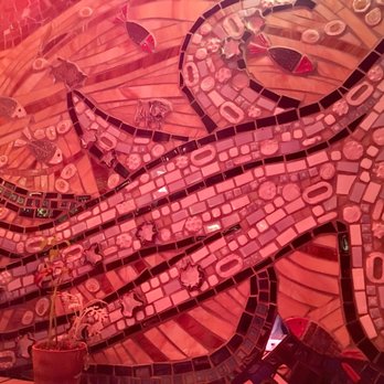 Ivan Ramen - Ivan Ramen - there's a back room with mosaic tile all around - this is part of the octopus! - Ramen Near Me - New York, New York