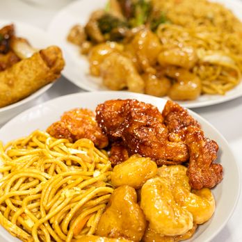 Happy Dragon - a plate of chinese food on a table - Chinese Near Me - Bakersfield, California