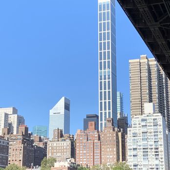Roosevelt Island - a view of a city from a boat - Farmers Market Near Me - New York, New York Roosevelt Island - a view of a city from a boat - Farmers Market Near Me - New York, New York