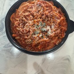 Bucatini with meat sauce (added chilli flakes and parmesan)