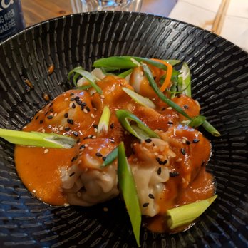 Sésame - a plate of food with sauce and scallions - Asian Fusion Near Me - Gatineau, Quebec Sésame - a plate of food with sauce and scallions - Asian Fusion Near Me - Gatineau, Quebec