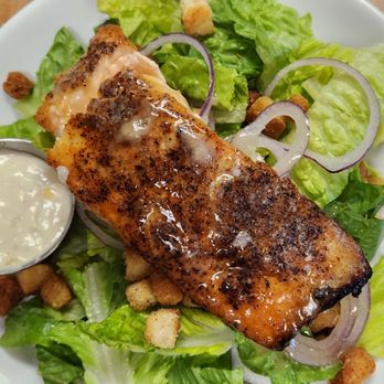 Oliver's Restaurant - Half pound of salmon in the Salmon Caesar Salad. - Italian Near Me - Torrington, Connecticut