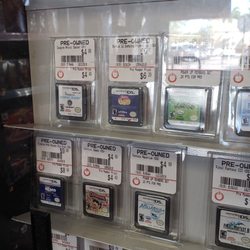Gamestop - Throwback to the 90's when they would have used Gameboy, Gameboy Color, and Gameboy Advanced (later on) games behind the glass.