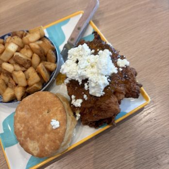 Biscuit Belly - Biscuit with fried chicken pepper jelly and goat cheese. Delicious - Breakfast & Brunch Near Me - Charlotte, North Carolina