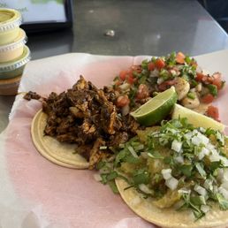 pollo con mole on left, fish on top, pork rind on bottom. pollo con mole on left, fish on top, pork rind on bottom.