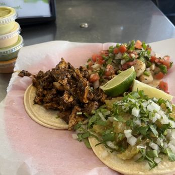 Taqueria Santa Barbara - pollo con mole on left, fish on top, pork rind on bottom. - Tacos Near Me - Santa Barbara, California Taqueria Santa Barbara - pollo con mole on left, fish on top, pork rind on bottom. - Tacos Near Me - Santa Barbara, California
