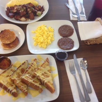 Orange Cafe Bistro - Cheese omelette with home fries and English muffin. Creme brûlée French toast combo with eggs and sausage - Breakfast & Brunch Near Me - Orange, California