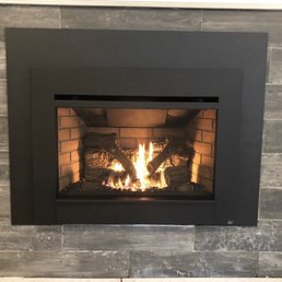 Our newly install gas fireplace insert. Our newly install gas fireplace insert.