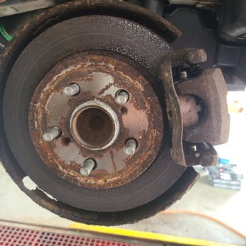 Jiffy Lube - My broken caliper on the driver's side. Jiffy Lube tech showed me. Them finding this and hustling to replace it might have saved my life. - Auto Repair Near Me - Feeding Hills, Massachusetts Jiffy Lube - My broken caliper on the driver's side. Jiffy Lube tech showed me. Them finding this and hustling to replace it might have saved my life. - Auto Repair Near Me - Feeding Hills, Massachusetts
