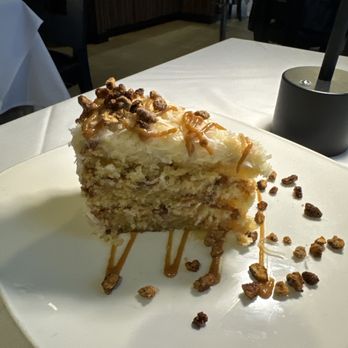 Davis Street at Hermann Park - Down south coconut cake - New American Near Me - Houston, Texas Davis Street at Hermann Park - Down south coconut cake - New American Near Me - Houston, Texas