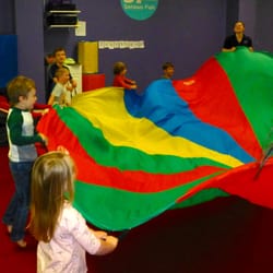 The Little Gym of West Boise - Parachute games leads to a ton of giggles