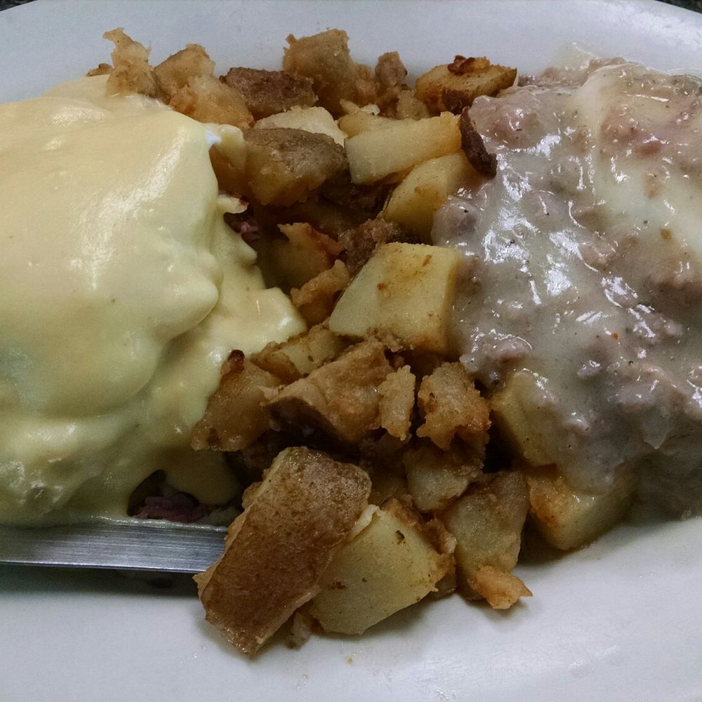 South Wedge Diner - Corned beef hash Benedict on the left, tatos and sausage Benedict on the right, so good - Diners Near Me - Rochester, New York South Wedge Diner - Corned beef hash Benedict on the left, tatos and sausage Benedict on the right, so good - Diners Near Me - Rochester, New York
