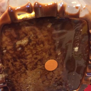 Portillo's & Barnelli's Summit - Bottom of CHOCOLATE ECLAIR CAKE - Hot Dogs Near Me - Summit, Illinois Portillo's & Barnelli's Summit - Bottom of CHOCOLATE ECLAIR CAKE - Hot Dogs Near Me - Summit, Illinois
