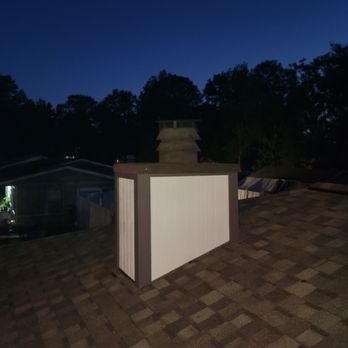 T&M Handyman Services - a chimney on a roof - Handyman Near Me