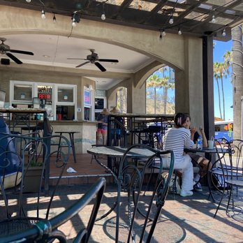 Coney Island West - a group of people sitting at tables - Burgers Near Me - Avalon, California Coney Island West - a group of people sitting at tables - Burgers Near Me - Avalon, California