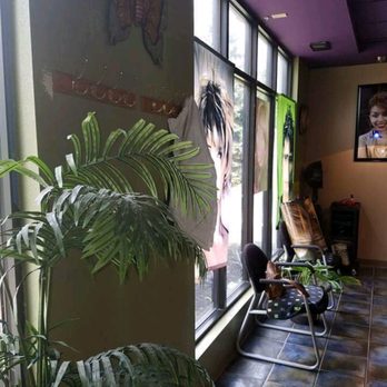 Ivy's Vine Fine Salon - a woman sitting in a chair - Hair Salons Near Me - Cheektowaga, New York Ivy's Vine Fine Salon - a woman sitting in a chair - Hair Salons Near Me - Cheektowaga, New York