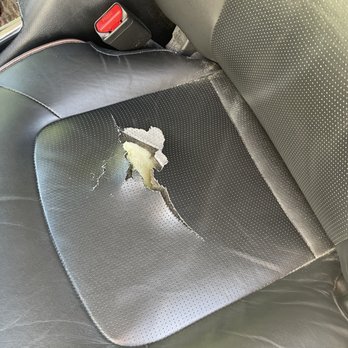 Hermanos Auto Upolstery - Crappy Nissan driver's seat leather tear/seat damage - Auto Upholstery Near Me - Thousand Oaks, California