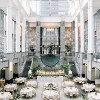 Pazzo's - a large atrium with tables and chairs - Mediterranean Near Me - Chicago, Illinois