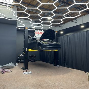 G'zox USA - Tesla Model 3 on the lift. - Auto Detailing Near Me - La Habra, California G'zox USA - Tesla Model 3 on the lift. - Auto Detailing Near Me - La Habra, California