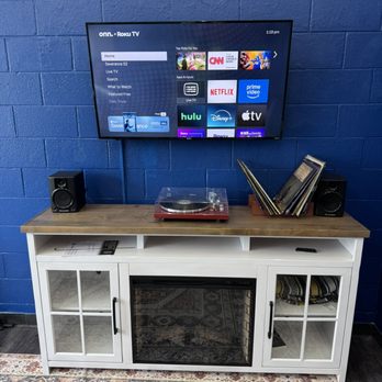 SmartHome Connect - Cinder Block Wall TV Mounting with courteous painting of wire molding. - TV Mounting Near Me