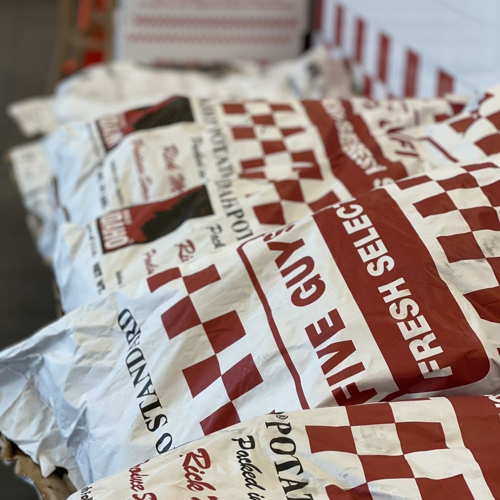 Five Guys - Bags of potatoes. They make some of the best fries in the world because they cook em in peanut oil. - Burgers Near Me - Morgan Hill, California Five Guys - Bags of potatoes. They make some of the best fries in the world because they cook em in peanut oil. - Burgers Near Me - Morgan Hill, California