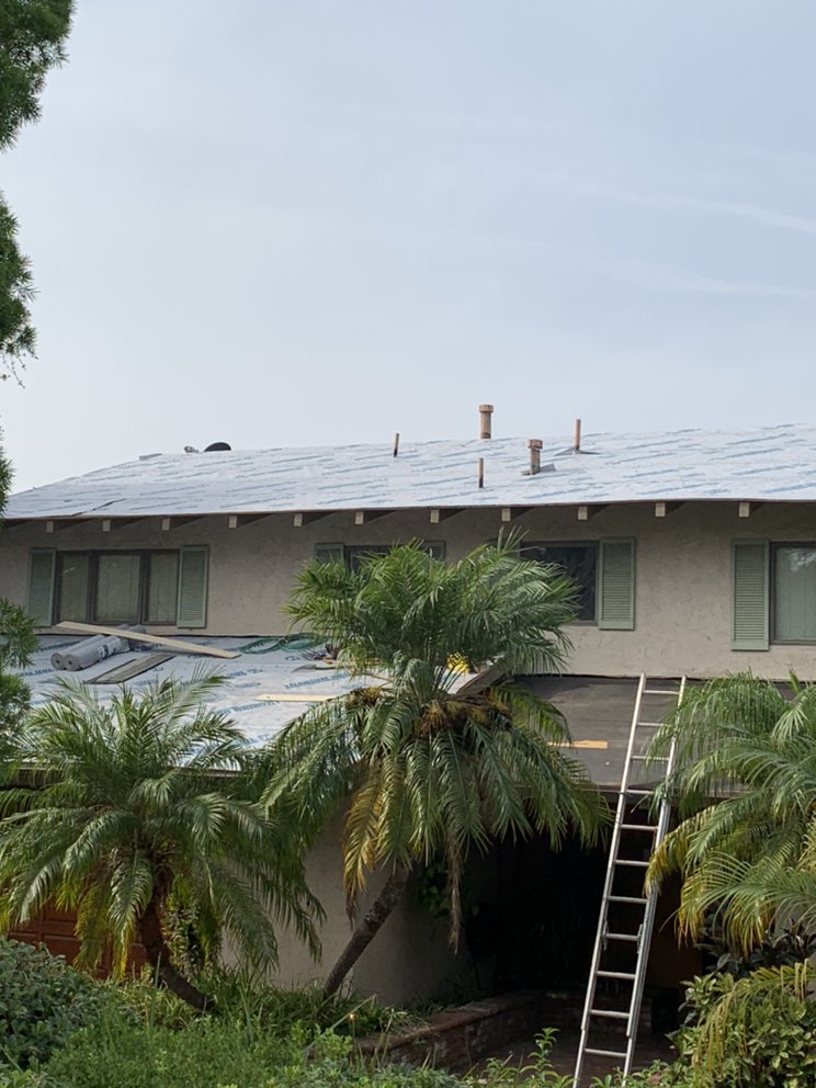 Slide of Davalos Roofing