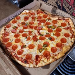 a pepperoni pizza in a pizza box a pepperoni pizza in a pizza box
