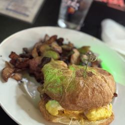 Wicked Wolf - Bacon egg and Chz croissant with potatoes