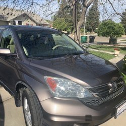 GOLDEN STATE AUTO GLASS & TINT - My 2010 Honda CR-V that really needed new paint on the hood and roof. But some body shop magic gave the old paint new life.