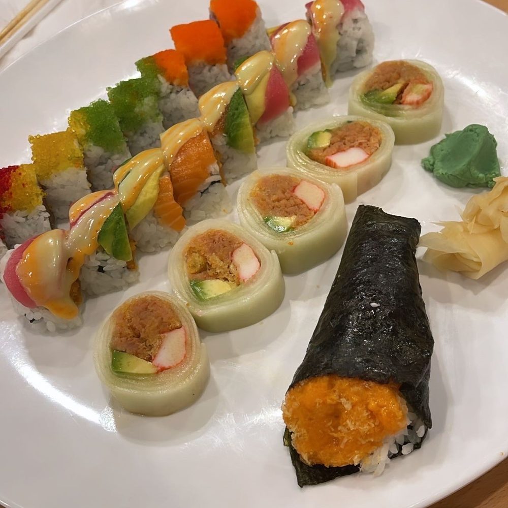 Sushi Kingdom Memphis - Going from far left: Fantastic roll, honey moon roll, spicy tuna naruto roll and spicy salmon hand roll - Sushi Bars Near Me - Memphis, Tennessee Sushi Kingdom Memphis - Going from far left: Fantastic roll, honey moon roll, spicy tuna naruto roll and spicy salmon hand roll - Sushi Bars Near Me - Memphis, Tennessee