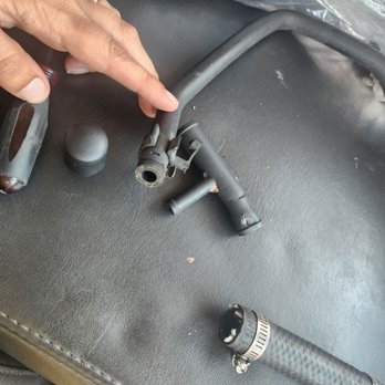 Gray's Automotive - A rigged radiator return hose. Suppose to be one part and the person that "fixed" it turned it into 4 different parts. - Auto Repair Near Me - Westminster, Colorado Gray's Automotive - A rigged radiator return hose. Suppose to be one part and the person that "fixed" it turned it into 4 different parts. - Auto Repair Near Me - Westminster, Colorado