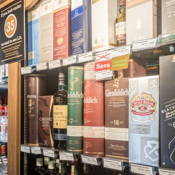 JAK's Beer, Wine & Spirits - a shelf full of liquor bottles - Beer, Wine & Spirits Near Me - Vancouver, British Columbia JAK's Beer, Wine & Spirits - a shelf full of liquor bottles - Beer, Wine & Spirits Near Me - Vancouver, British Columbia