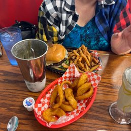 Mushroom Swiss burger with fries and side of rings