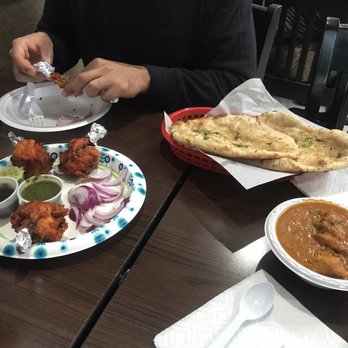 Daawat Indian Cuisine - Chicken lollipops, chicken curry and garlic naan - Indian Near Me - Phoenix, Arizona Daawat Indian Cuisine - Chicken lollipops, chicken curry and garlic naan - Indian Near Me - Phoenix, Arizona