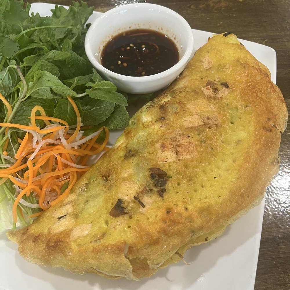 Sunflower Vietnamese Cuisine - Tofu Vegan Crepe - Banh Xeo Chay. Ask for fish sauce cause I don't know what they were serving with this - Vietnamese Near Me - Austin, Texas Sunflower Vietnamese Cuisine - Tofu Vegan Crepe - Banh Xeo Chay. Ask for fish sauce cause I don't know what they were serving with this - Vietnamese Near Me - Austin, Texas