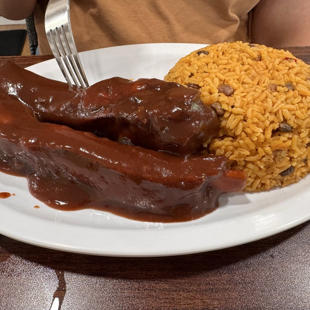 El Tipico Restaurant - Ribs and yellow rice. - Latin American Near Me - Nashua, New Hampshire El Tipico Restaurant - Ribs and yellow rice. - Latin American Near Me - Nashua, New Hampshire