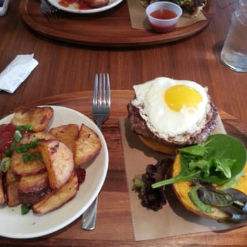 Dooby's - Brunch burger with hash (Korean BBQ cheesesteak in the back) - Coffee & Tea Near Me - Baltimore, Maryland