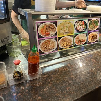 Omi Japanese Food - a man preparing food - Japanese Near Me - Calgary, Alberta