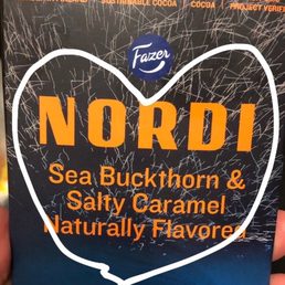 a person holding a box of candy a person holding a box of candy