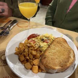 The Ann - scrambled with basil, tomato and goat cheese