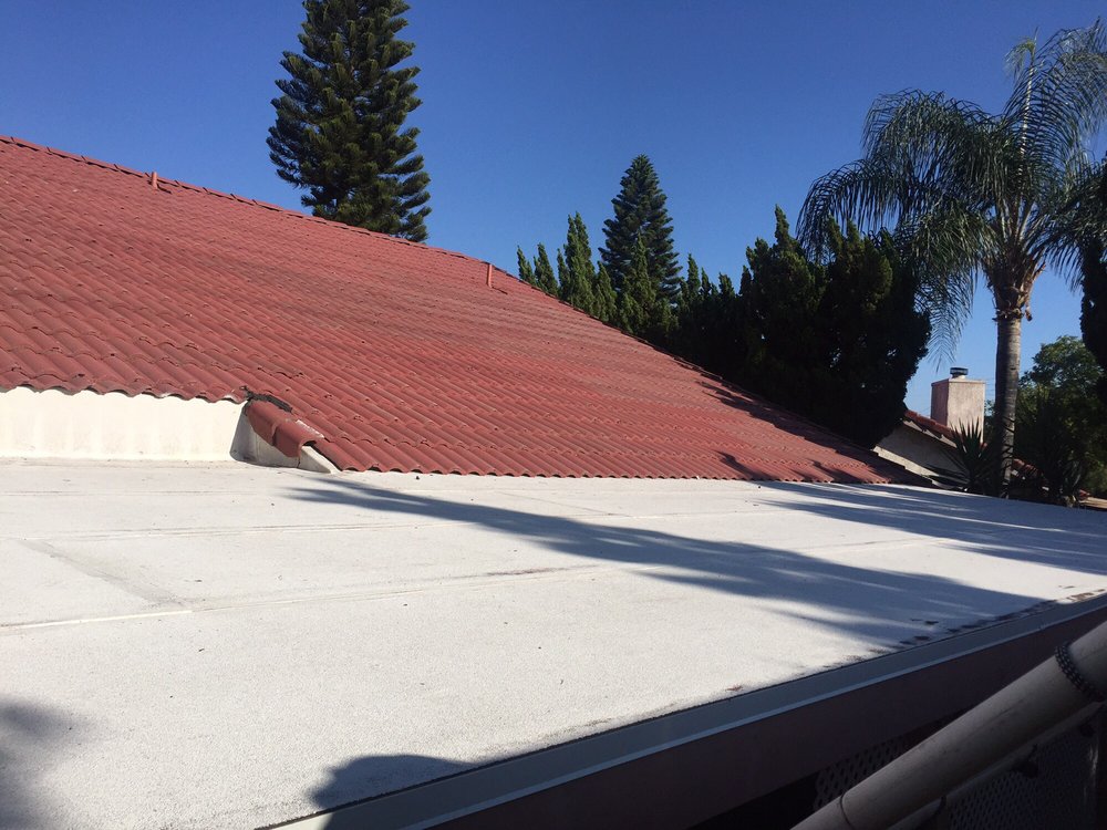 Slide of Mike's Roofing & Building