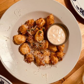 Central Pizza & Bar - a plate of fried tater tots - Bars Near Me - Lafayette, Louisiana Central Pizza & Bar - a plate of fried tater tots - Bars Near Me - Lafayette, Louisiana