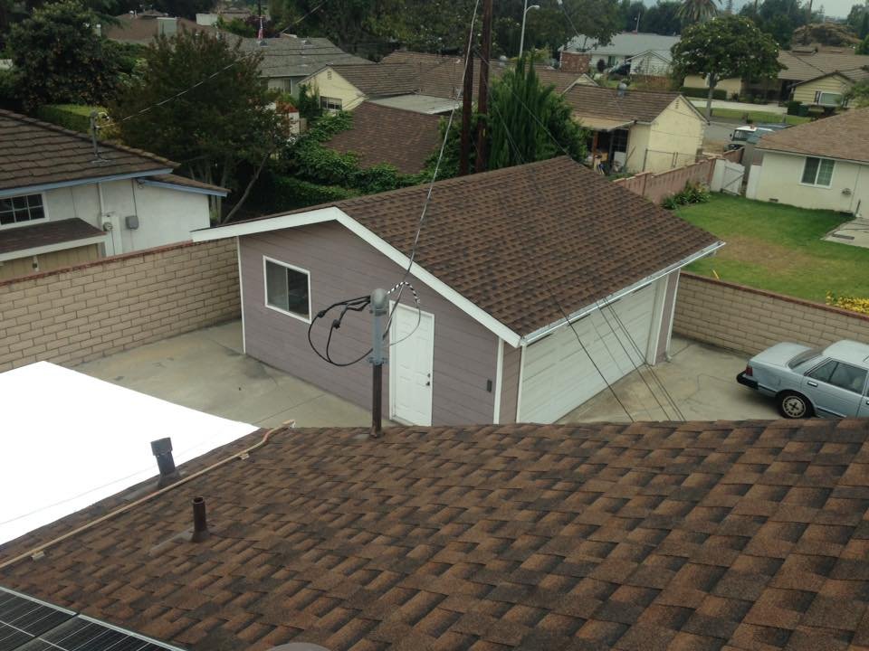 Slide of Douglas Cote Roofing