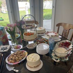 Isabelle Briens French Pastry Cafe - Dessert of lemon cake on the far upper right with strawberries on top.