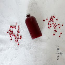 The Juice Box - 100% organic fresh squeezed pomegranate juice