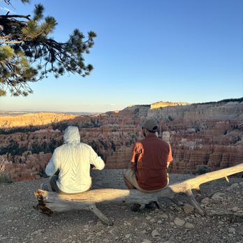 Corey’s Sittin’ Logs - Dudes sitting on logs - Hiking Near Me