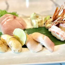 Kusshi - Scallop Nigiri (2 Pieces), Yellowtail Sashimi (3 Pieces), Yellowtail Nigiri (2 Pieces), Sweet Shrimp Nigiri (2 Pieces)