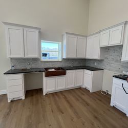 Lyndi & Co Design Studio - Granite, backsplash and flooring! Amazing!
